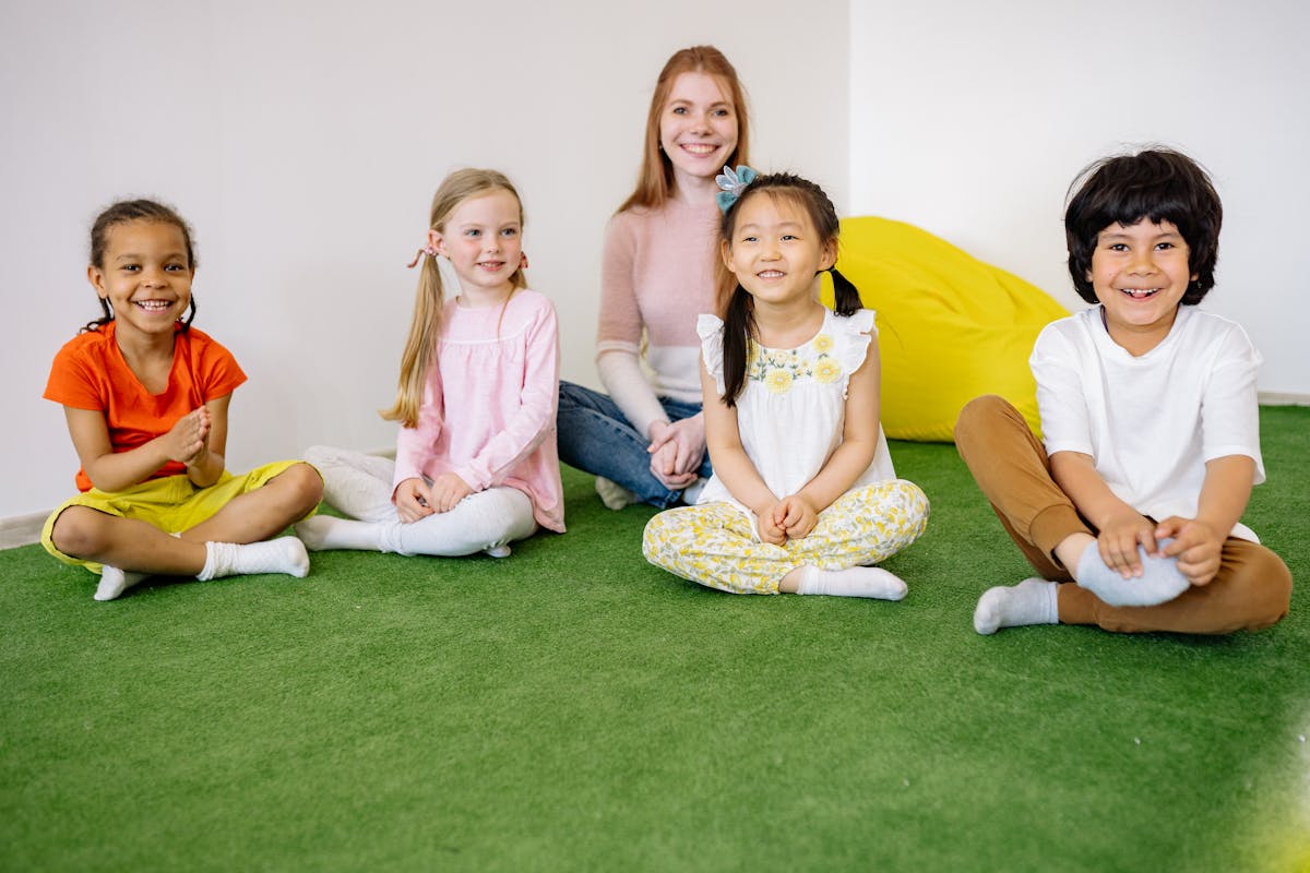 Therapist supporting a child during community-based ABA therapy in a natural outdoor setting